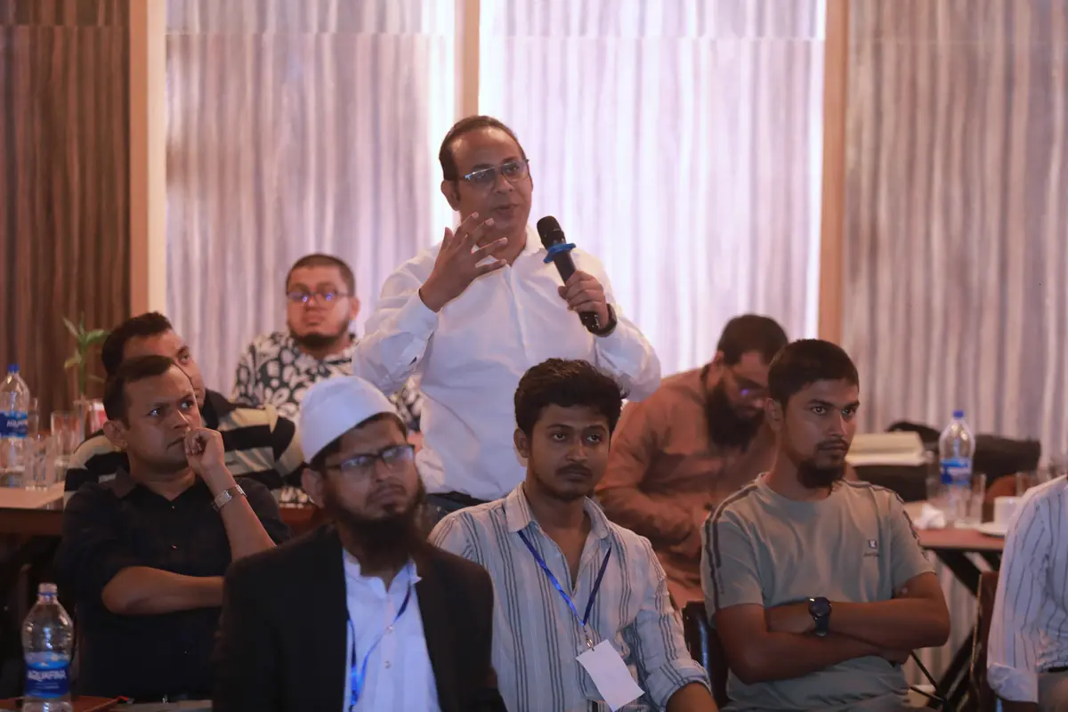 An attendee asking a question
